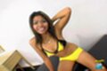 Seated with arm raised wearing underwear