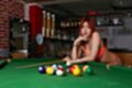 Leaning on pool table