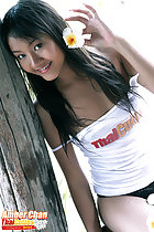 Holding flower long hair bare shoulders