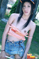 Top falling from her small tits wearing denim skirt lowering her panties
