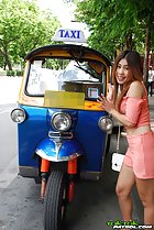 Standing beside tuktuk